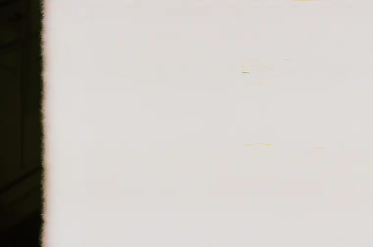 Frame 1, almost completely white from light leaking onto the film