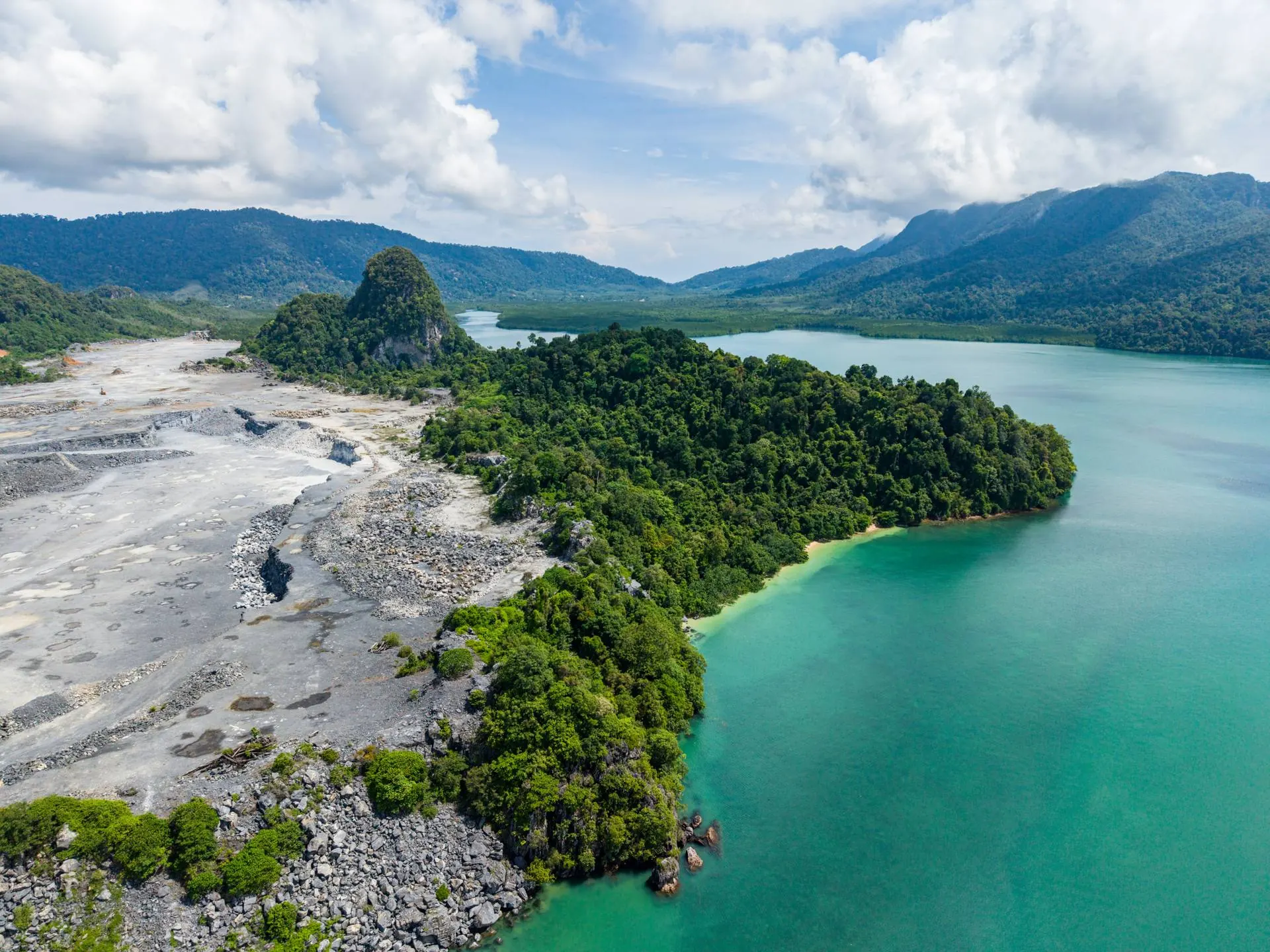Aerial of white sand beach and clear sea at Pulau Beras Basah, Langkawi