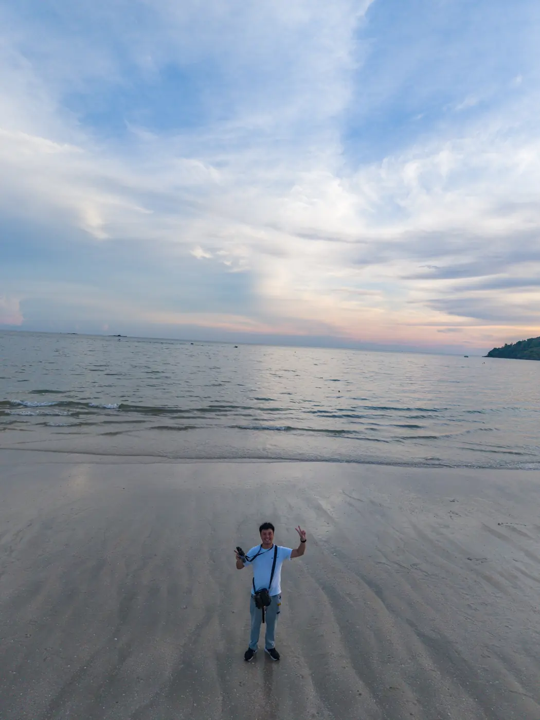 Group on the white sand beach of Pulau Beras Basah