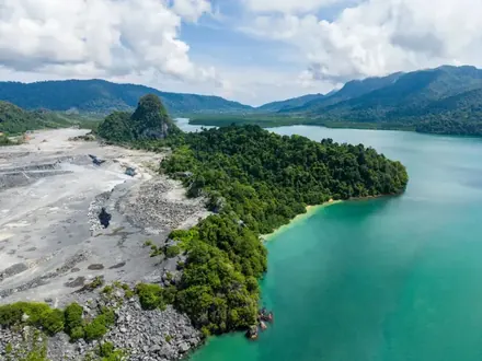 Aerial of white sand beach and clear sea at Pulau Beras Basah, Langkawi