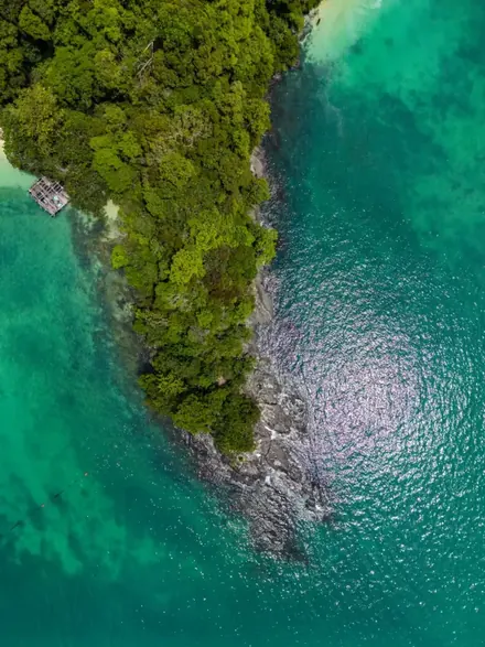 Turquoise lagoon and limestone cliffs in Langkawi